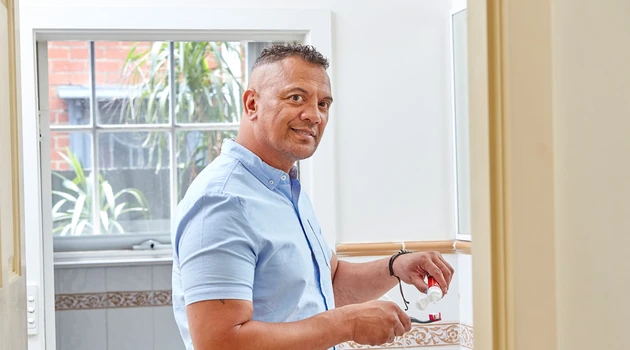 Man brushing teeth