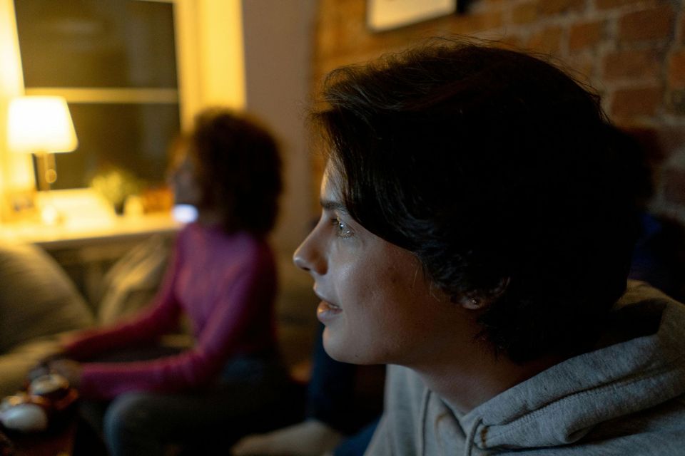 Young people playing video game