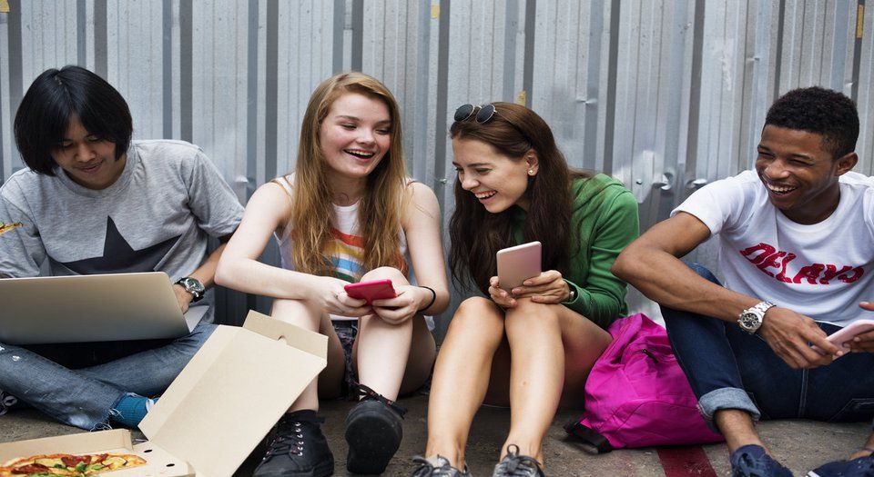 Teens sitting and chatting