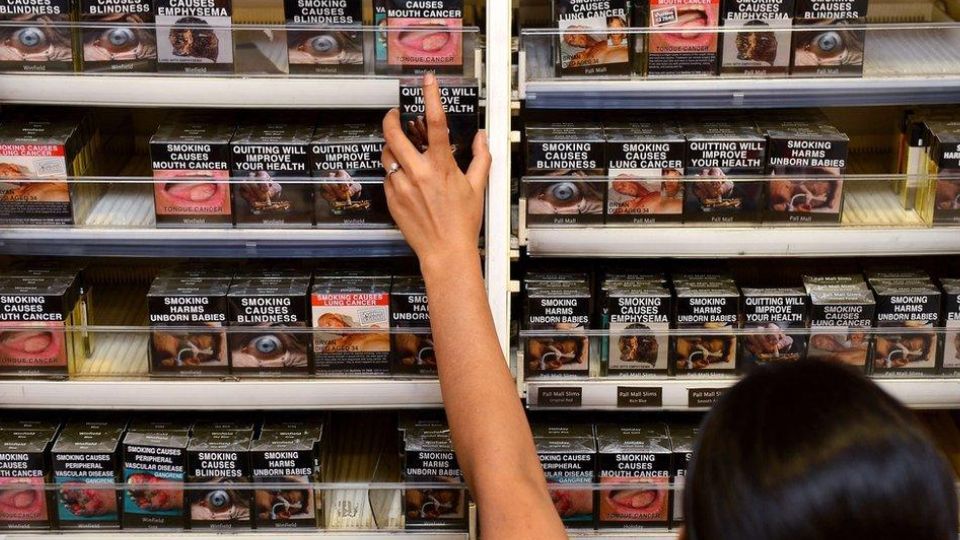 harmful tobacco packaging on shelf